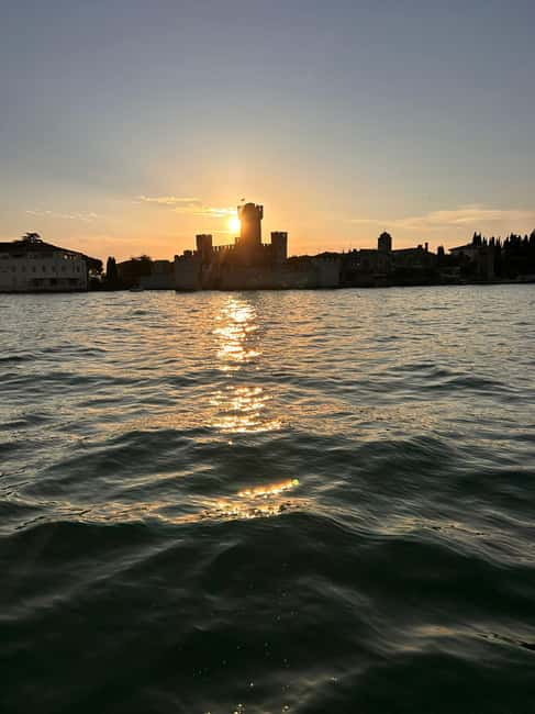Desenzano del Garda: Sunset Boat Trip at Sunset with Drink - Prosecco Toast + Music: The Mood on Board