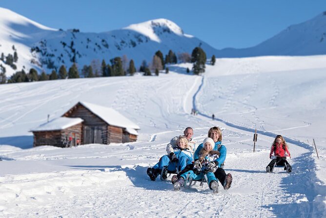 Dolomites of Bolzano Winter Hiking & Sledding Experience - Lunch at a warm mountain hut: your reset button (own expense)