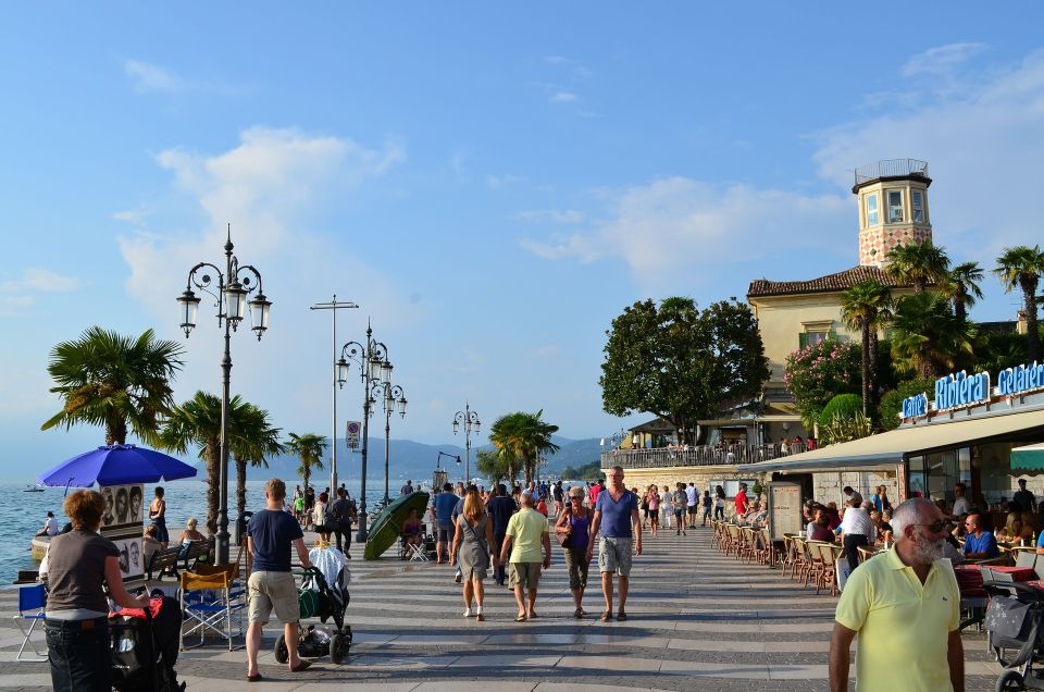 Full-Day Lake Garda Tour: Bus & Public Boat with Guide - Limone sul Garda and Malcesine: When the Shore Meets the Hills