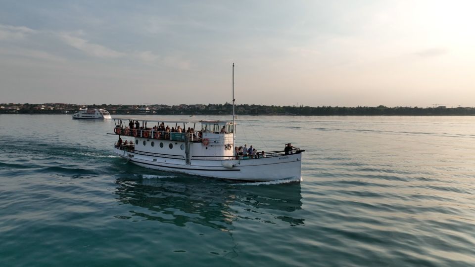 Peschiera: Afternoon Boat Trip to Sirmione with Swim Stop - Cruising the southern shore: what the water view changes