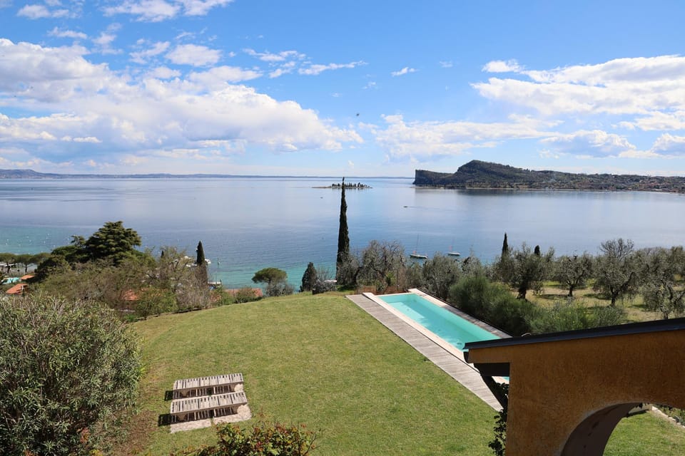 San Felice: Olive Oil Tasting with local food on Garda Hills - The Grove Walk Toward Rocca di Manerba