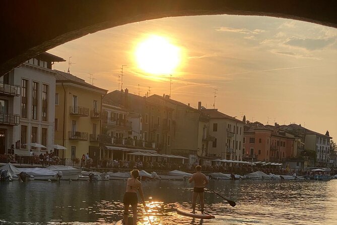 Sup experience with a ride to Peschiera del Garda Lake Garda - The SUP Route Through Peschiera’s Canals and Under-Bridge Moments
