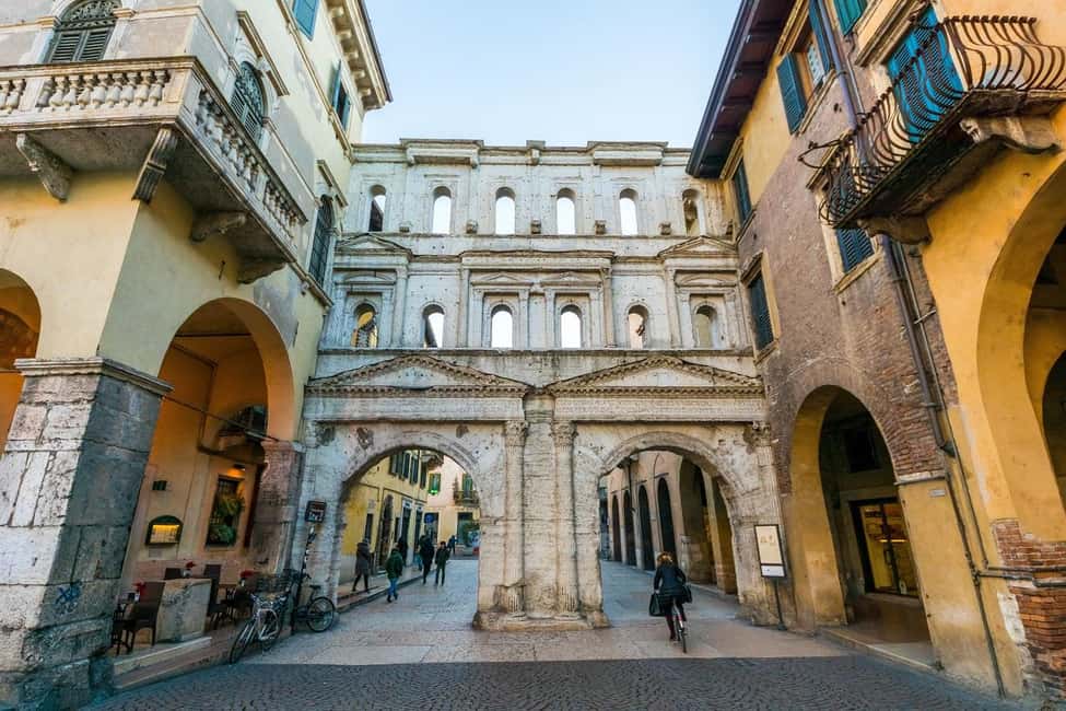 Verona: City Walking Tour with Cable Car & Wine Aperitif - Signori Square, Erbe Square, and the medieval core