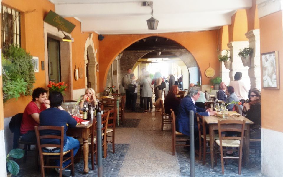 Verona: History and Hidden Gems Guided Walking Tour - Piazza delle Erbe: Market Life, Facades, and an Old Fountain