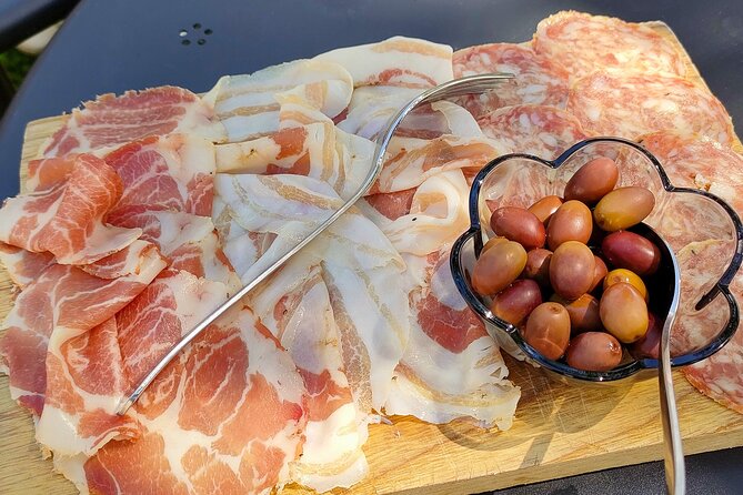 Wine Tasting with Local Food in Lazise Countryside - Setting and vibe in the Lazise countryside (and what to do if it rains)